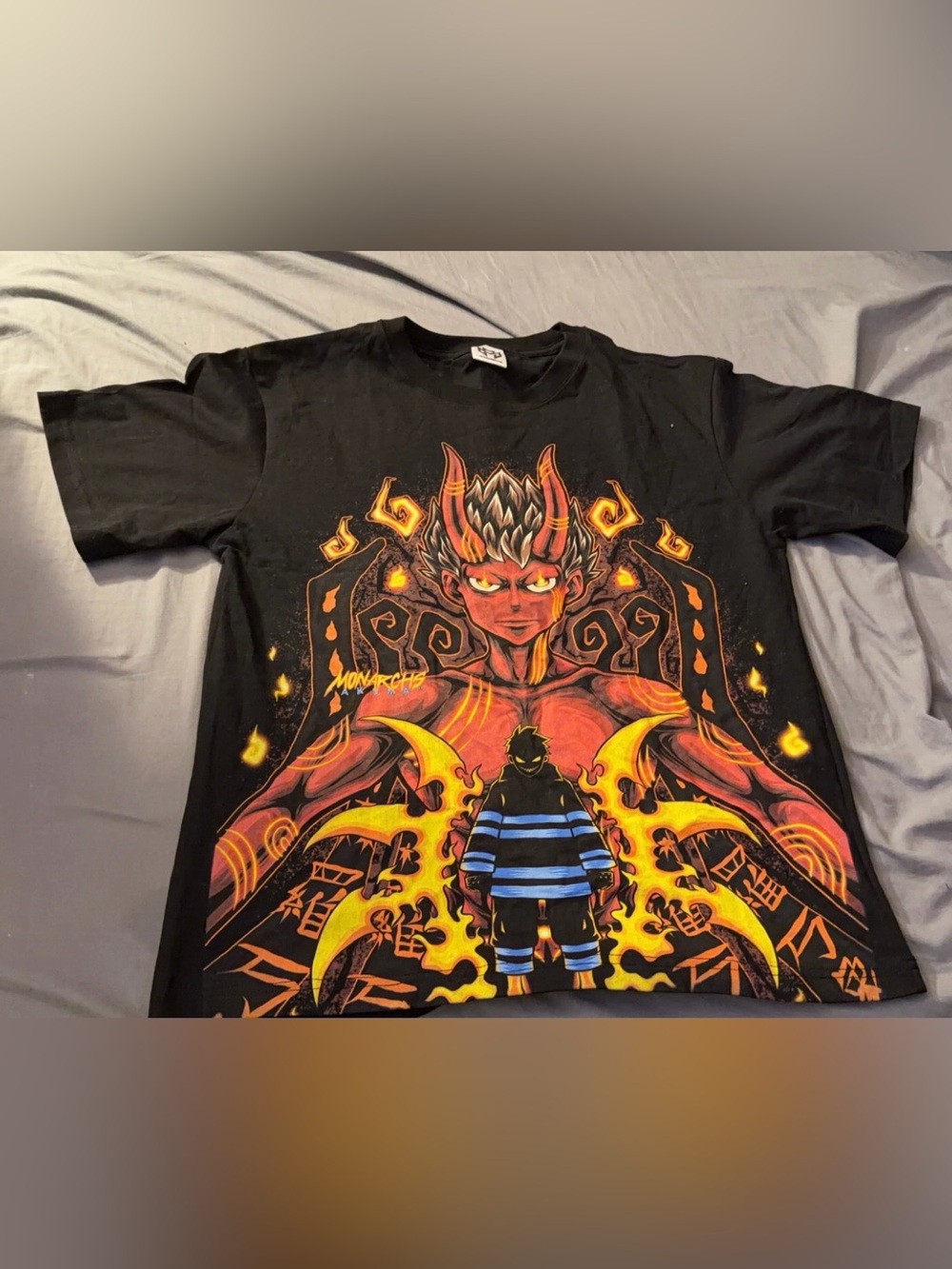 Monarch Fire Force Black Demon Graphic Tee with Fiery Orange & Yellow Artwork